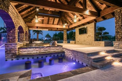 Fantastic Multi Use Pool Area With Swim Up Bar Built In