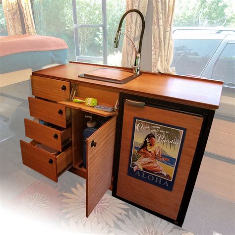 There are many options when considering how to create the kitchen area in your van. Van Conversion Upgrade with a Custom Kitchen - CreatID