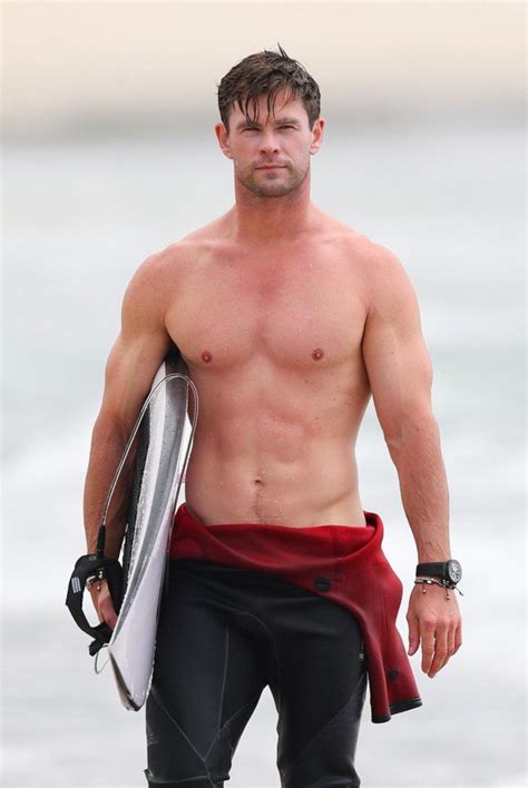 Chris Hemsworths Shirtless Surfing Pics Are Going Viral For The Right