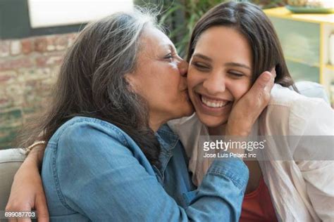 Young Woman Kiss Old Woman Photos Et Images De Collection Getty Images