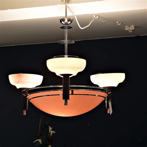 Art deco daffodil shell ceiling light. Art Deco chrome large ceiling light with pink shades.