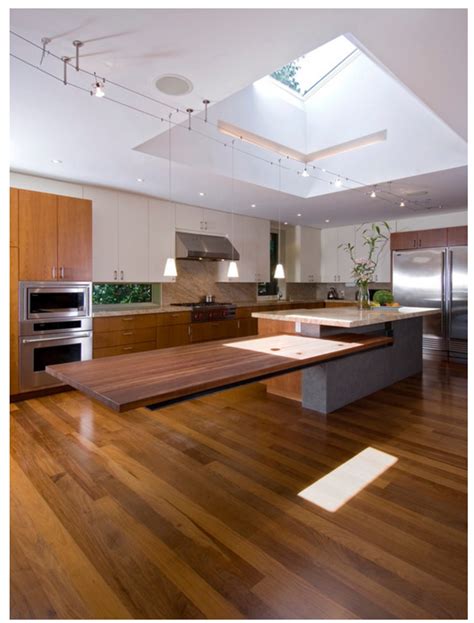 Kitchen islands with seating generally feature cantilevered countertops supported by table legs, 12 kitchen island ideas with seating. Dining table attached to kitchen island. | Custom kitchen island, Kitchen island design, Kitchen ...