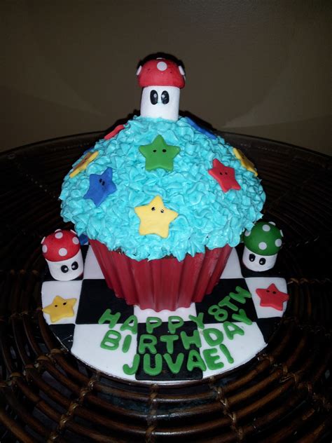 Especially in children's birthday, they always love enjoying a tasteful cupcake. Super Mario GIANT cupcake | Giant cupcakes, Large cupcake