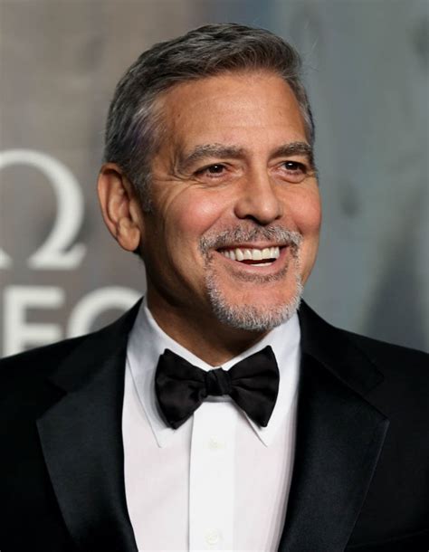 Looking for george clooney on facebook? George Clooney looks sharp at OMEGA anniversary event