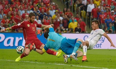 This is his non rare gold card. Chile proves too hot as lackluster Spain exits World Cup early