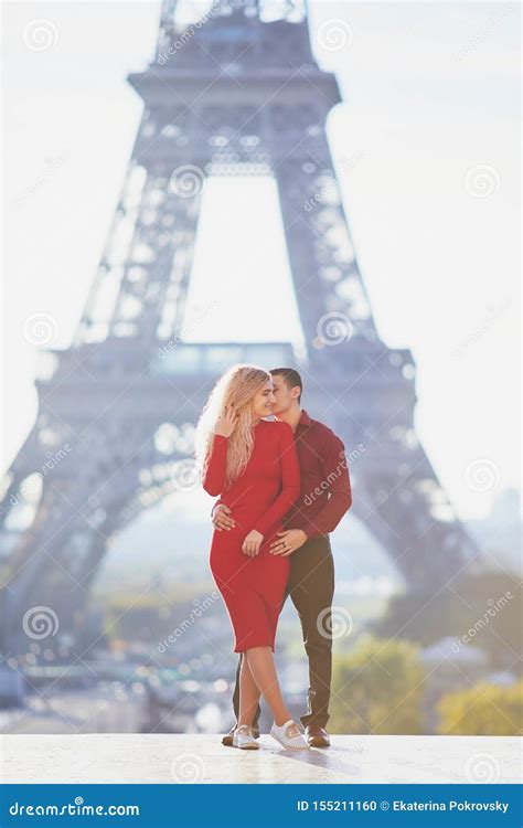 Romantic Couple In Love Near The Eiffel Tower Stock Photo Image Of