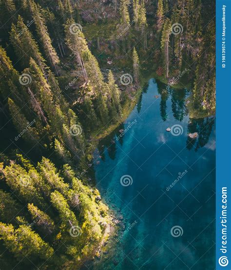 Aerial View Of Turquoise Blue Water Of Lake Carezza In Alps Dolomites