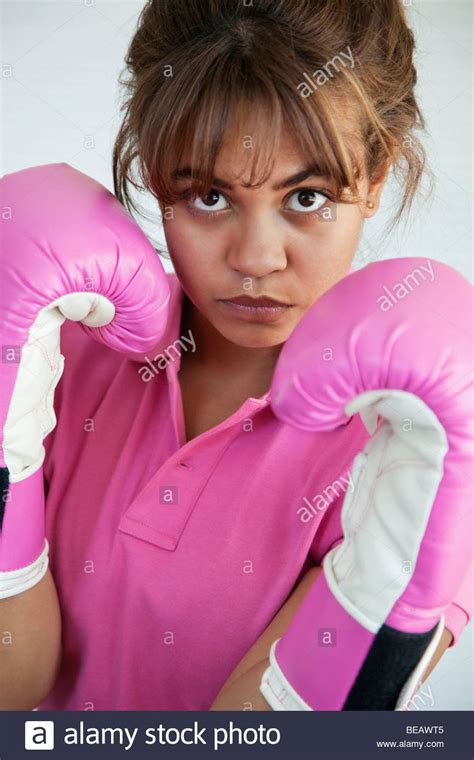 Hispanic Woman Wearing Pink Boxing Gloves Stock Photo Alamy