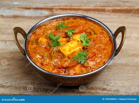 Indian Food Or Indian Curry In A Copper Brass Serving Bowl Stock Photo