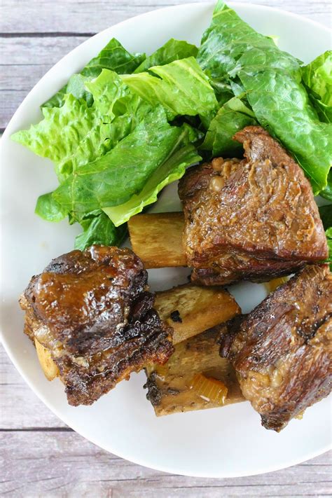 Transfer the ribs to the slow cooker. braised beef short ribs