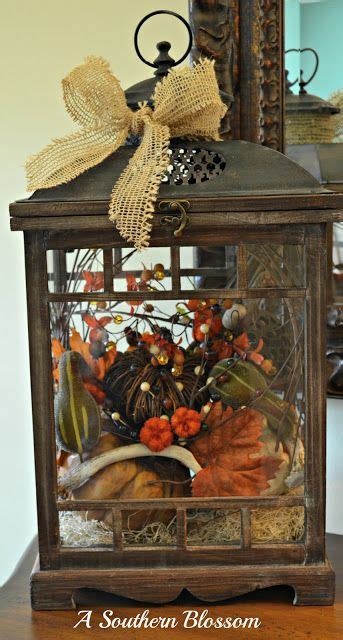 The open wood frame concept allows you to use a real candle with a glass hurricane and gives space to add floral or other decor items around the base. Decorating with Lanterns on Pinterest | Lanterns, Fall ...