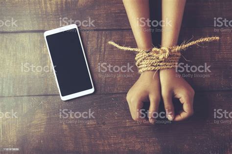 Hands Tied By Strong Rope With Mobile Stock Photo Download Image Now