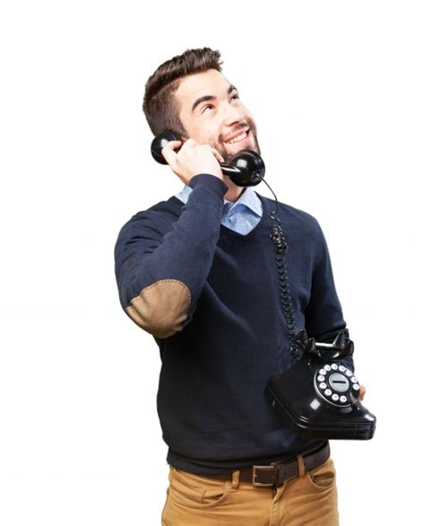 Maybe you would like to learn more about one of these? Glücklicher Junge, der oben schaut, während am Telefon ...