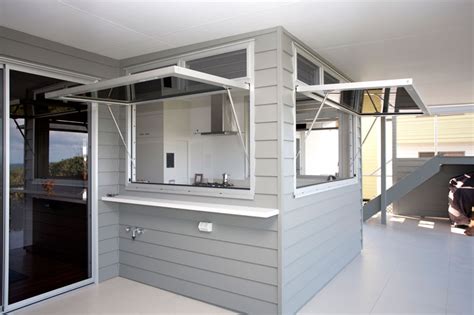 The gas strut servery windows open allowing a cool breeze in summer to get in. Gas Strut Servery Windows | Lifestyle Windows