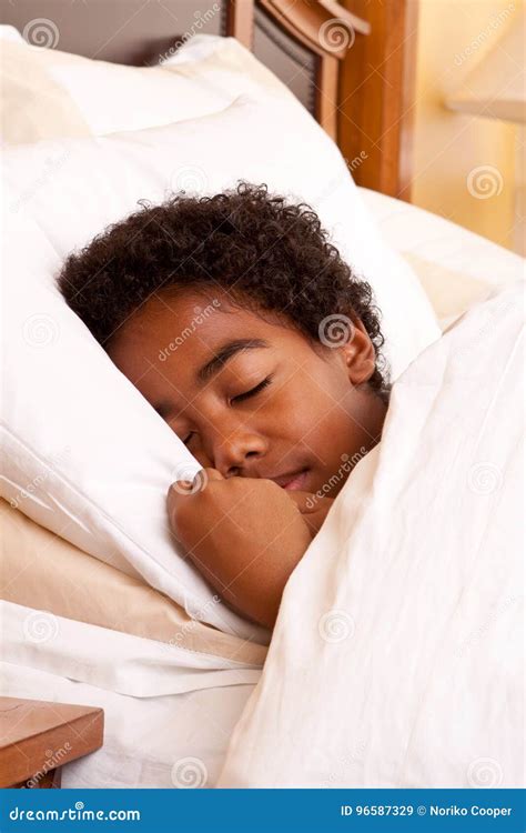 African American Boy Sleeping In His Bed Stock Image Image Of