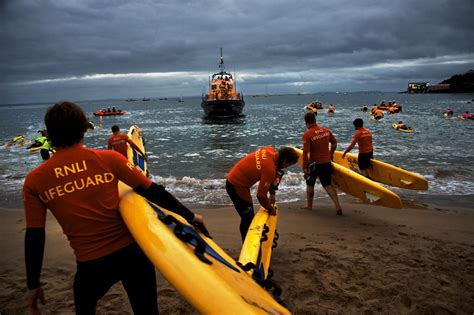 Working alongside lifeboat stations & providing safety education within the wider community. RNLI lifeguards at Tenby in South Wales - lifeguards and ...