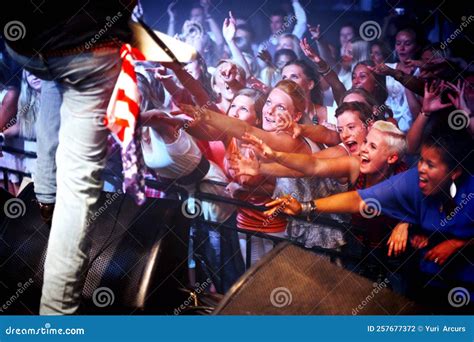 Groupies Reaching Out To Touch Their Music Idol This Concert Was Created For The Sole Purpose