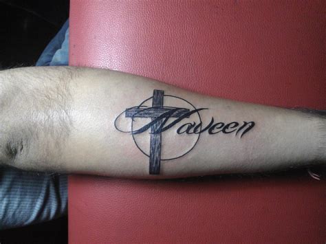 Cross tattoos require a certain balance and these two certainly create a dramatic look. Tattoos Designs, Pictures And Ideas: Cross And Name Tattoo ...