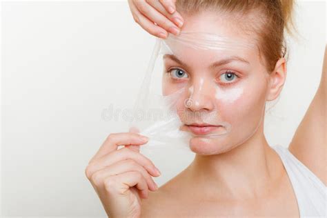 Woman Removing Facial Peel Off Mask Stock Photo Image Of Clear
