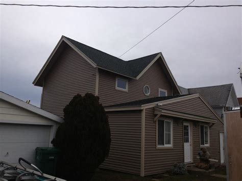 Cedar siding & gutter w/leaf guards. Vinyl Siding - Siding Installed by Marshall Exteriors ...