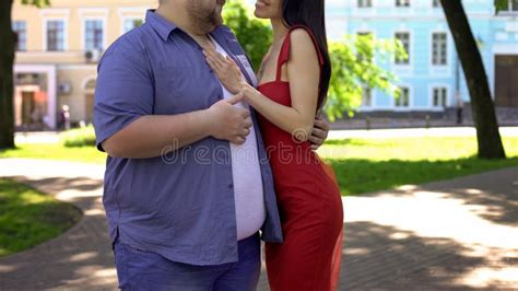 Overweight Male Hugging Beautiful Slim Girlfriend Inner Beauty In