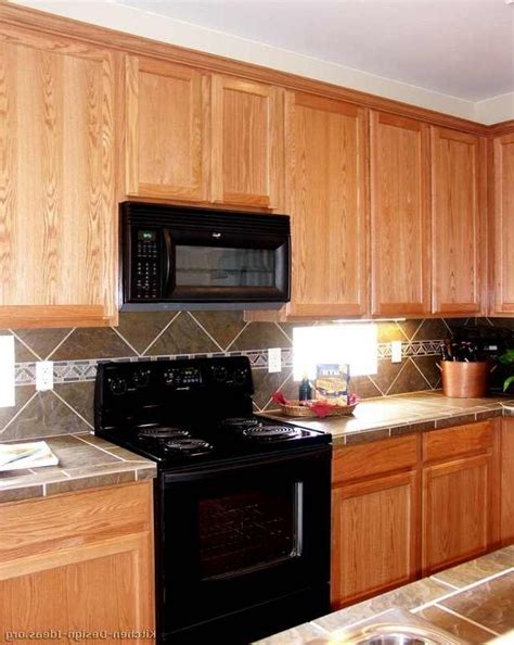 Before & after pictures of kitchen remodel. Red oak kitchen cabinet photos