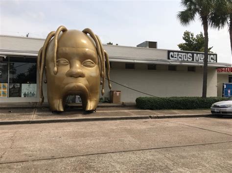 Unknown year and go the. There's a huge gold Travis Scott head outside Cactus Music