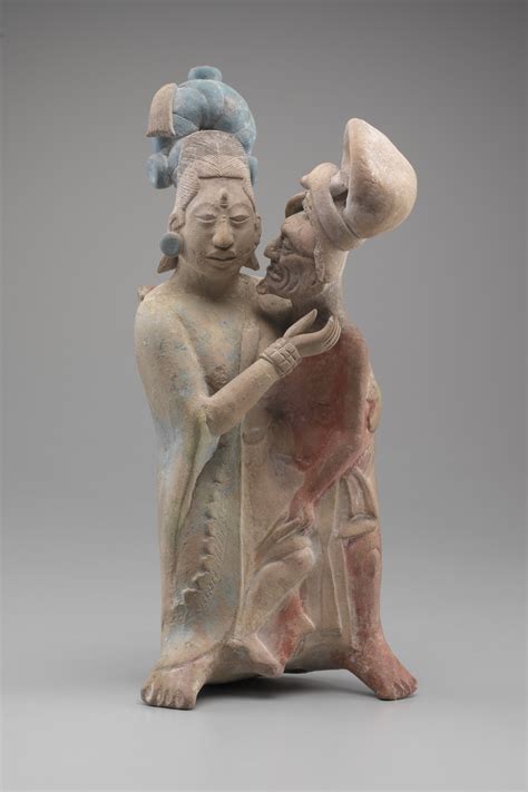 A Painted Mayan Figurine Of An Embracing Couple Made Of Terracotta