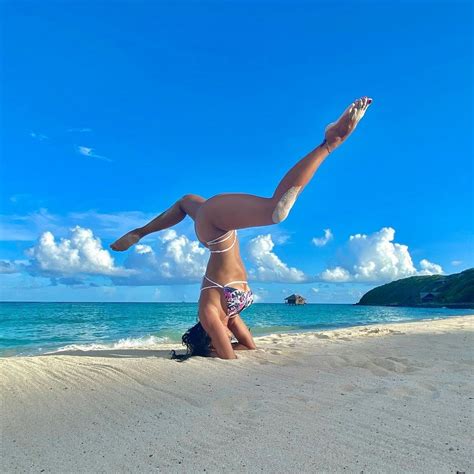 Nicole Scherzinger Shows Off Her Flexibility In A Bikini On The Beach