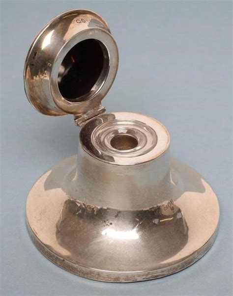 A Silver Capstan Inkwell Hartleys Auctioneers And Valuers