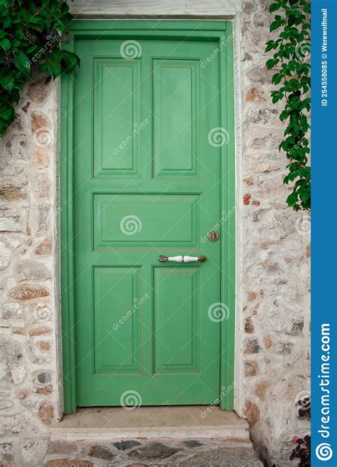 Front Door Of A Old Stone House Green Street Door Close Up Stock