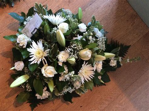 Free local delivery for bouquets, balloons and gifts. White teardrop spray | Floral wreath, Funeral tributes, Floral