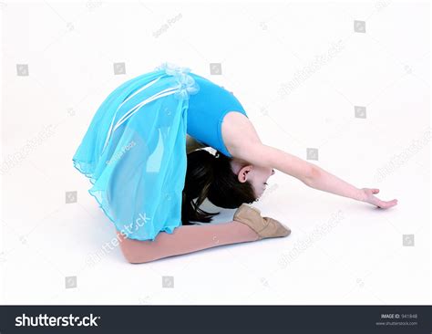 Girl In Blue Dress Doing A Backbend Stock Photo 941848 Shutterstock