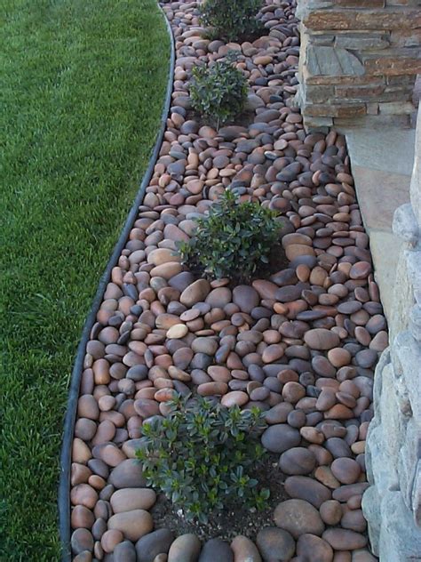 Landscaping With Gorgeous Polished River Rocks A Lot Of Different