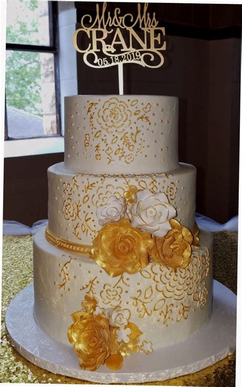 They prefer to find something new, trendy and out of this world. Gold And White Wedding Cake - CakeCentral.com