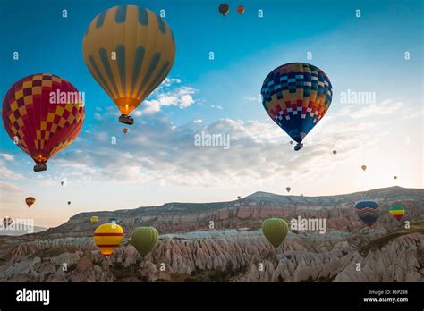 Hot Air Balloons Fly Over Cappadocia Stock Photo Alamy