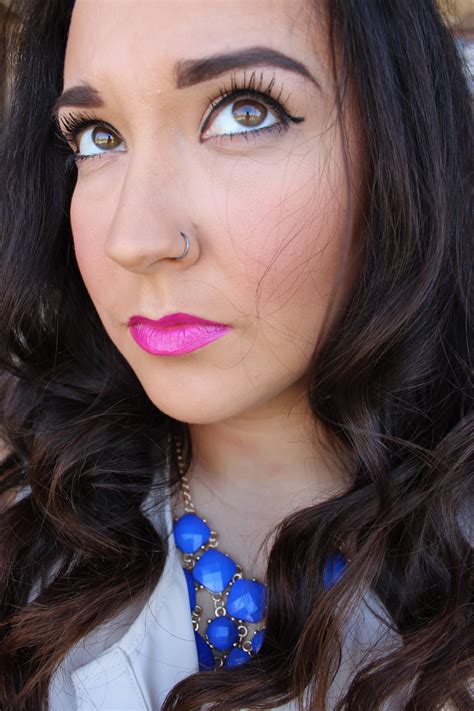 Winged Eyeliner Bright Pink Lips 60s Makeup