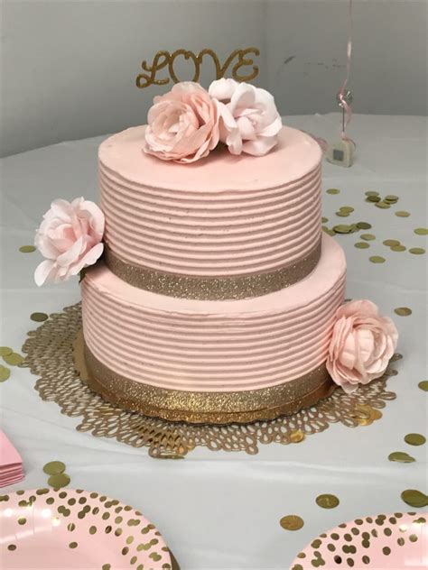 Brides who love the spotlight need a captivating bridal shower dress, and this stunner fits the bill. Blush Pink & Gold Bridal Shower Ideas - Six Clever Sisters