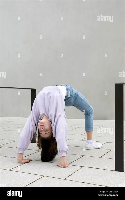 Girl Bending Over Backwards Hi Res Stock Photography And Images Alamy