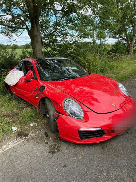 Driver Destroys £100000 Porsche Sports Car After Crashing Into