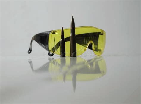 Shooters Equipment Special Yellow Shooting Glasses And Rifle Bullets
