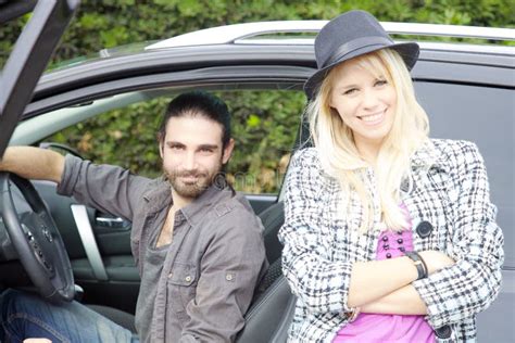 Happy Hipster Couple Front Car Smiling Looking Camera Stock Photos