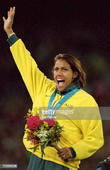 Cathy Freeman Of Australia On The Podium Celebrating Gold In The News Photo Getty Images