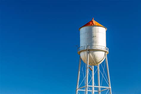 Small Town Water Tower Photograph By Todd Klassy Pixels
