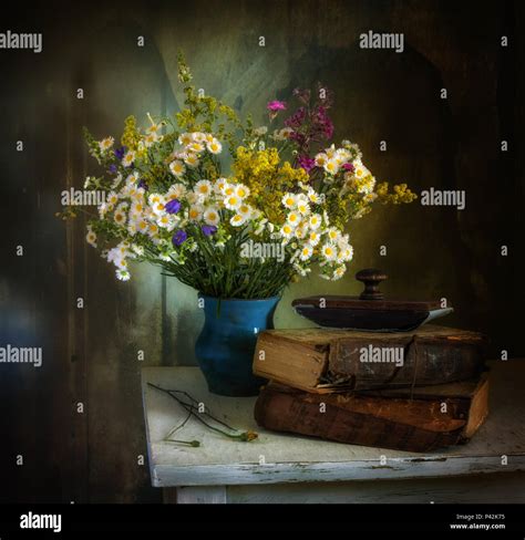 Still Life With Flowers And Books Vintage Stock Photo Alamy