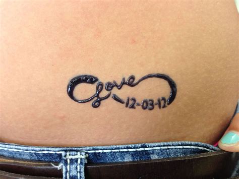 To begin the process of henna tattoos could also cause skin irritations, especially for those who have sensitive skin. "Love" and date inside of infinity henna tattoo - Henna ...