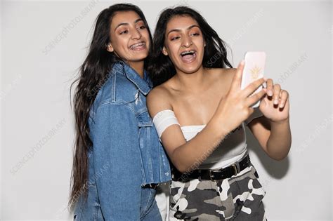 Teenage Twin Sisters Taking Selfie Stock Image F0238879 Science