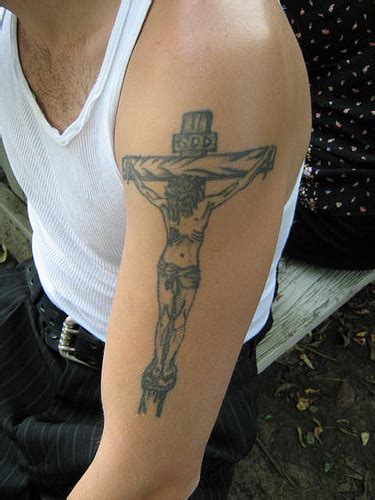Tattoo on his right forearm. Crucifix Tattoos Designs, Ideas and Meaning | Tattoos For You