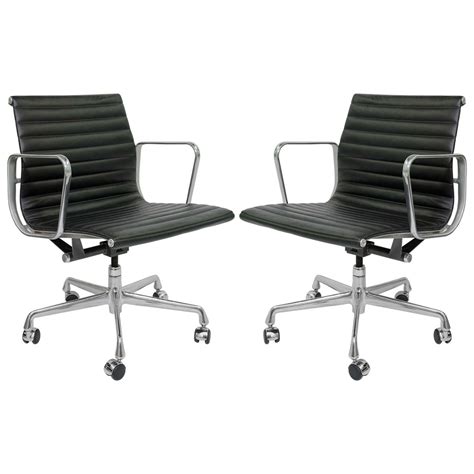 Swivels and is height adjustable. Pair of Herman Miller EA335 Eames Aluminum Group ...