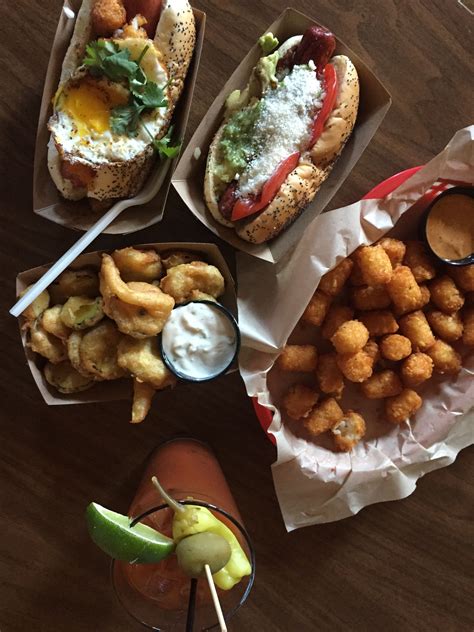 Step 2 meanwhile, slice hot dogs into 1/2 coins. Prairie Dog's hot dogs, sea Salt Tater tots, and fried ...